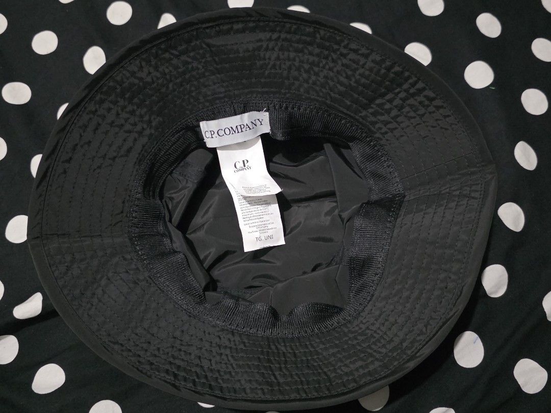 C.P. Company Bucket Hat (Category: Caps & Hats) located in Baguio. Submitted by chr0m3_h3arts (Listing ID 1464477213, Image 3). Description: 👨: Ano po issue? Me: Wala po. 👨 How much po? Me: 1500+sf po. 👨: Location? Me: Baguio City po not faded po, lighting lang po 10/10 condition and color rate.
