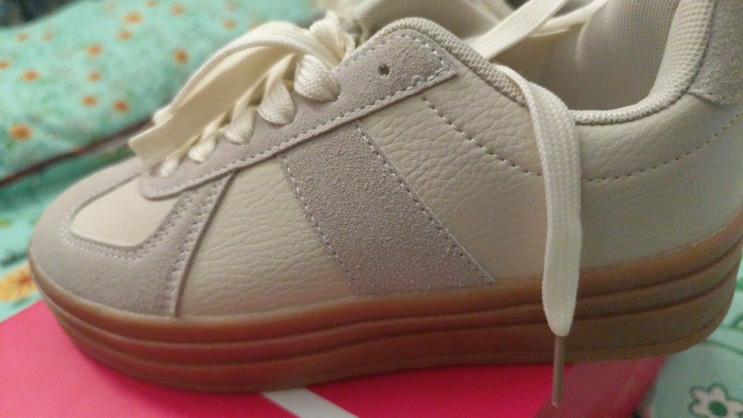 Cream & Pink Suede Sneakers (Category: Sneakers) located in Manila. Submitted by marriage031073advocate (Listing ID 1464408596, Image 3). Description: - Cream and grey colorway - Suede and leather accents - Classic lace-up closure - Durable gum sole - Comfortable for all-day wear - Stylish design - Estimated size: 7 or 8 (please check measurements).
