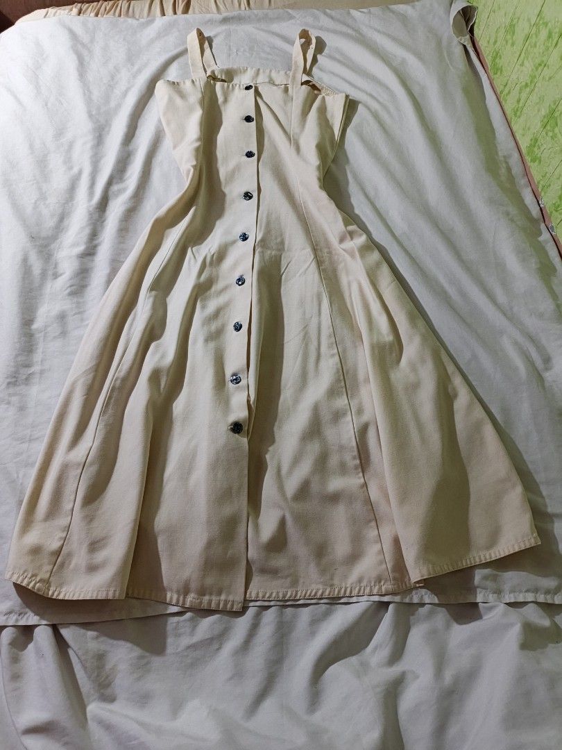Cream Button-Front Midi Dress with Straps (Category: Dresses) located in Manila. Submitted by ms_pamaqued (Listing ID 1464355090, Image 1). Description: - Cream-colored midi dress - Button-front design with dark buttons - Adjustable straps for a perfect fit - Flattering A-line skirt that flares out - Versatile for casual or semi-formal occasions - Easy to style for any look.