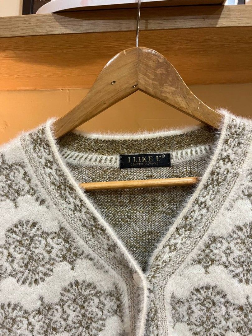 Cream patterned knitted cardigan (Category: Coats, Jackets and Outerwear) located in Quezon City. Submitted by michypeachyy1 (Listing ID 1464494081, Image 2). Description: 250 plus shipment 23 inches width 27.5 inches length.