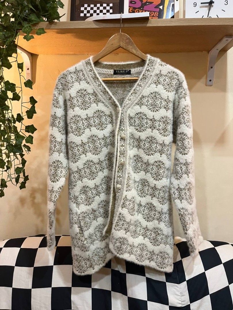 Cream patterned knitted cardigan (Category: Coats, Jackets and Outerwear) located in Quezon City. Submitted by michypeachyy1 (Listing ID 1464494081, Image 1). Description: 250 plus shipment 23 inches width 27.5 inches length.