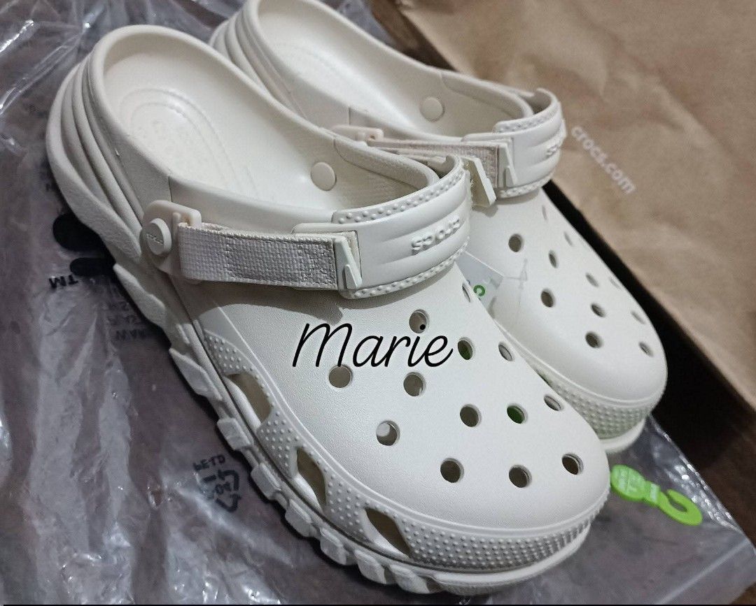 Crocs Duet Max II Clog in Stucco (Category: Slippers & Slides) located in Manila. Submitted by missmariemnl (Listing ID 1464458795, Image 1). Description: - Brand new Crocs Duet Max II clogs - Color: Stucco - Size: Men's 10 / Women's 12 - Unique sole tread pattern for enhanced grip - Original tags still attached - Ideal for everyday casual wear.