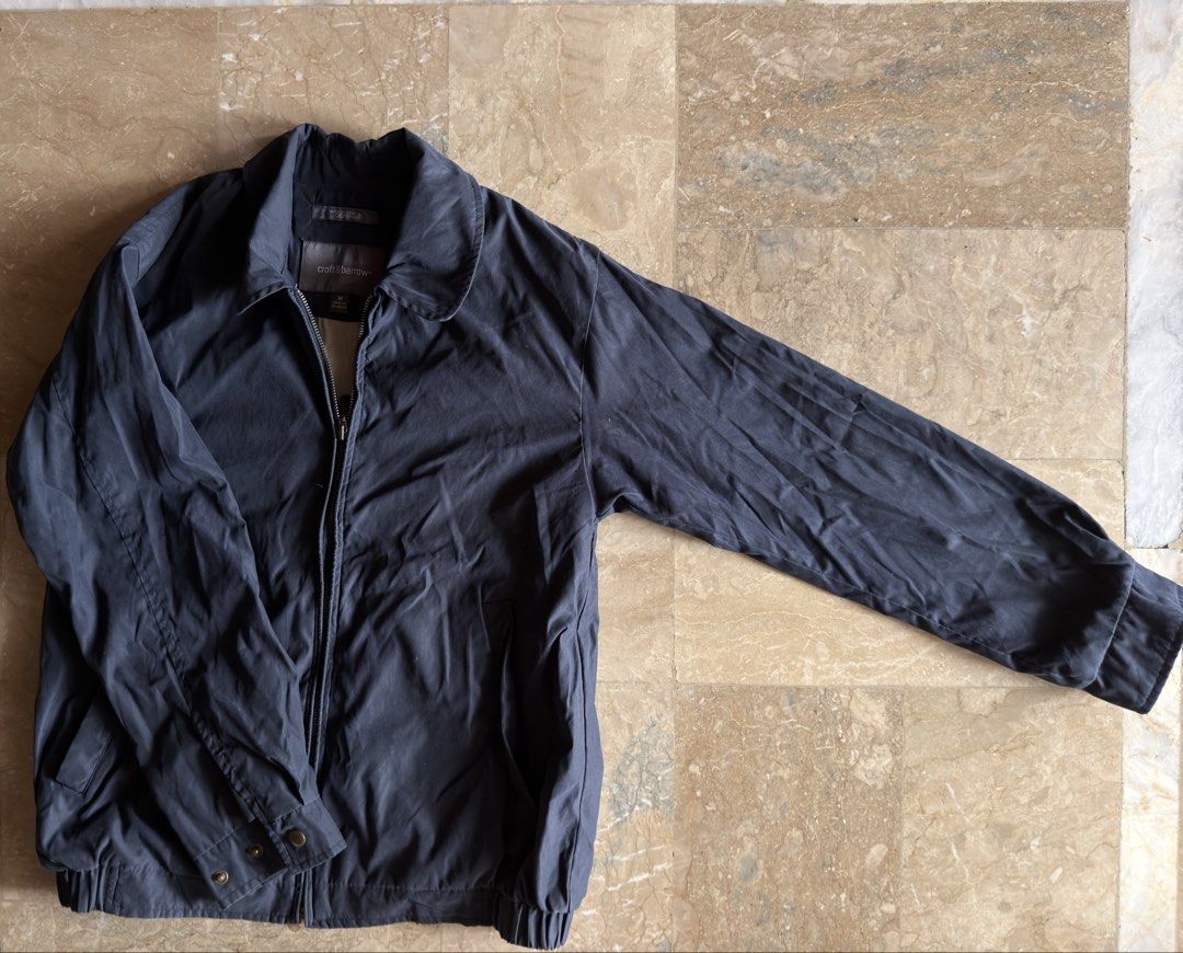 Croft & Barrow Men's Navy Bomber Jacket Size M (Category: Coats, Jackets and Outerwear) located in Cabanatuan. Submitted by bellasntg (Listing ID 1464399413, Image 1). Description: - Navy blue bomber jacket by Croft & Barrow - Size: Medium - Zip-up front with collared neckline - Elasticated cuffs and hem for a snug fit - Two decorative button details at the bottom hem - Origin: Made in Sri Lanka MOP: 💳 GCash 💳 Maya 🏦 Bank Transfer Mode of Ship