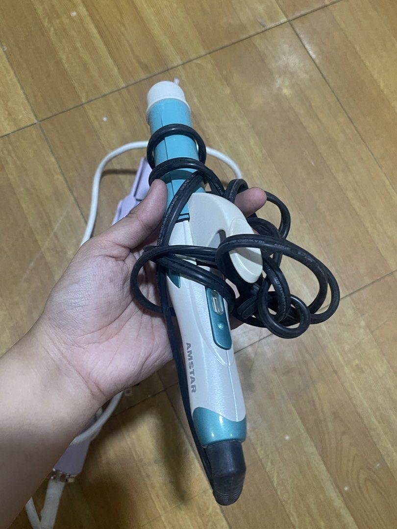 Curling Iron | Get Both (Category: Hair) located in Paranaque City. Submitted by lovenclutter (Listing ID 1464521689, Image 3). Description: Get both na po for 450, yung purple umiikot tapos yung green standard curling iron RFS: Need funds for tuition & di na nagagamit.