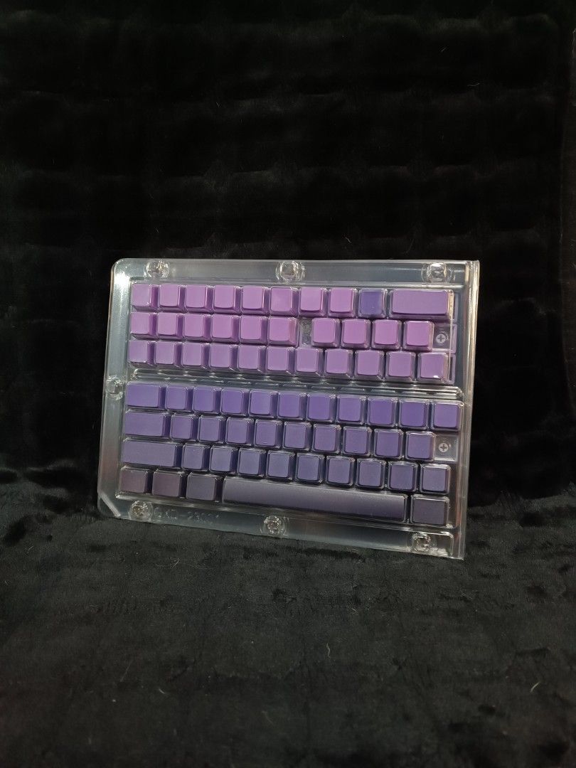 Custom Mechanical Keyboard Keycaps Set - Various Colors (Category: Computer Keyboard) located in Quezon City. Submitted by gabrielc44587 (Listing ID 1464453321, Image 2). Description: - Custom keycaps for mechanical keyboards - Available colors: Green, Purple, Red/Brown Gradient - High-quality for a unique look and feel - Enhance your typing experience - Message for specific set details.