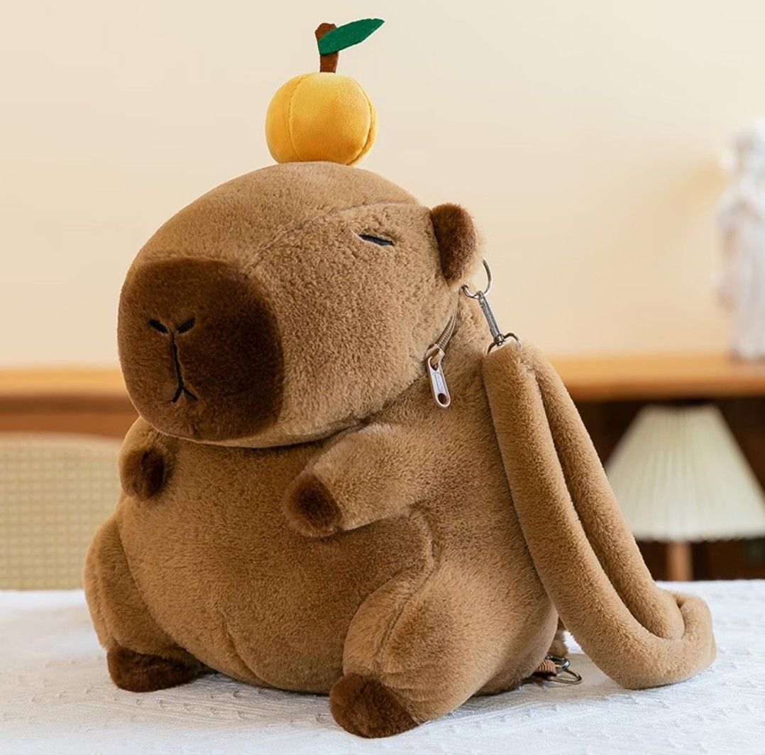 Cute Capybara Plush Backpack with Accessories (Category: Plushies & Soft Toys) located in Antipolo. Submitted by jovy24 (Listing ID 1464510494, Image 2). Description: - Adorable capybara plush backpack - Made with soft and fuzzy material - Includes cute attachable accessories: burger, fries, flower, and orange - Ideal for kids or anyone who loves cute items - Features adjustable straps for a comfortable fit - Zipper closure for the main compartme