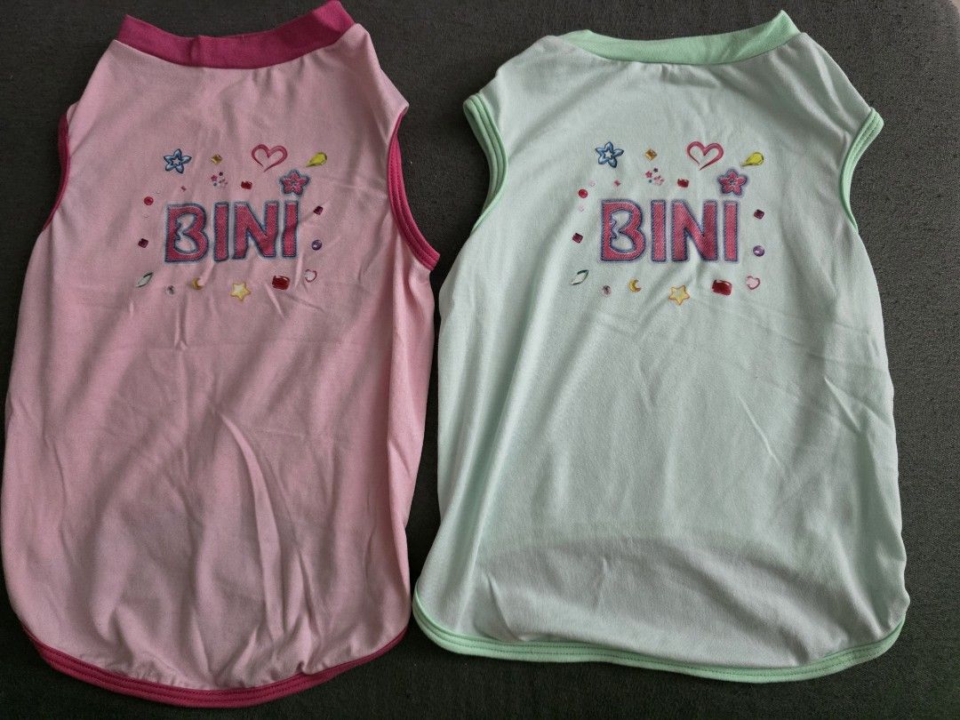 Cute Pet Clothes - Various Designs (Category: Homes & Other Pet Accessories) located in Bacoor. Submitted by stuffatbp.ph (Listing ID 1464525074, Image 1). Description: - Take ALL! Bundle of adorable pet shirts! - Fun designs: pandas, boba tea, Barbie, Little Mermaid, zebra print, cats, flowers, and 'BINI' text. - Sleeveless style for comfort and freedom of movement. - Made from soft and breathable fabric to keep your pet cool. - Perfect for mixi