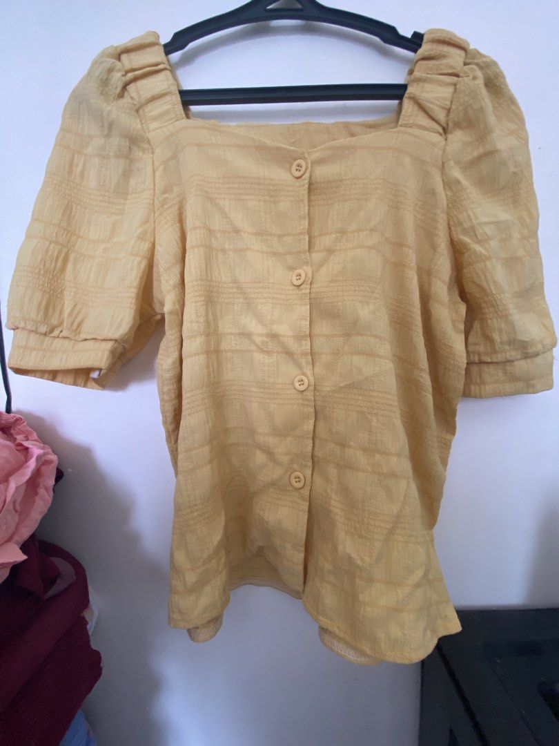 Cute Puff Sleeve Tops - Various Colors (Category: Blouses) located in Cavite. Submitted by goldenbear.3e82a9 (Listing ID 1464404156, Image 1). Description: - Bundle of adorable puff sleeve tops - Features stylish square necklines - Convenient button-up fronts - Available colors: Yellow, Pink, Floral Print, Red, White - Versatile for casual outings or dressing up - Mix and match with your favorite skirts, shorts, or pants.