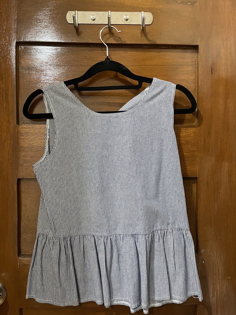 Cute Sleeveless Peplum Top (Category: Sleeveless) located in Manila. Submitted by bbhzl (Listing ID 1464398341, Image 1). Description: - Cute striped sleeveless top - Bought at a local clothing fair RFS: Decluttering .