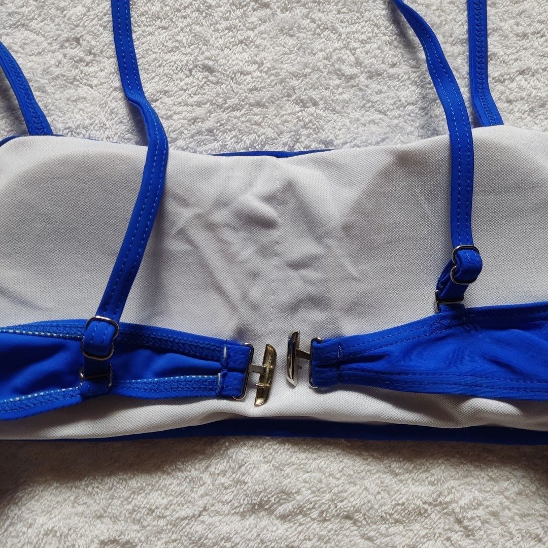Dark Blue Two Piece Bikini Swimsuit Set (Category: Bikinis & Swimsuits) located in Bacoor. Submitted by kmrynl (Listing ID 1464413998, Image 3). Description: Rfs: decluttering - issue: small bleach stain (see photos) - with pads, adjustable straps and clasp on bikini top, garterized waist on bottoms - no ww; manage expectations - see last photos for measurements (in) MOP: Maribank/BPI only MOD: J&T/Lalamove.