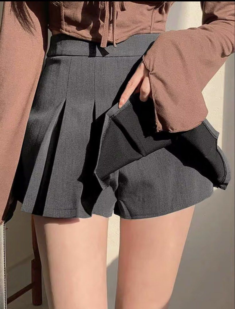 Dark Grey Pleated Mini Skirt (Category: Skirts) located in Villasis. Submitted by juliaxgamboa (Listing ID 1464438813, Image 3). Description: - Best fits Small - Cute dark grey pleated mini skirt - High-waisted fit - Perfect for preppy or Y2K aesthetic - Easy to style with tops and boots - Great for casual outings or events.