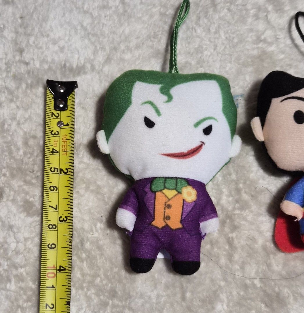 DC Comics Joker & Superman Plush Toy Keychains (Category: Plushies & Soft Toys) located in Mandaue City. Submitted by chuchi152615 (Listing ID 1464403776, Image 2). Description: - Set of 2 DC Comics plush toy keychains - Includes The Joker and Superman - Both feature a loop for hanging - Approximately 4 inches tall each - Ideal for fans of DC Comics, movies, or cartoons - Perfect for decorating bags, backpacks, or as a small gift.