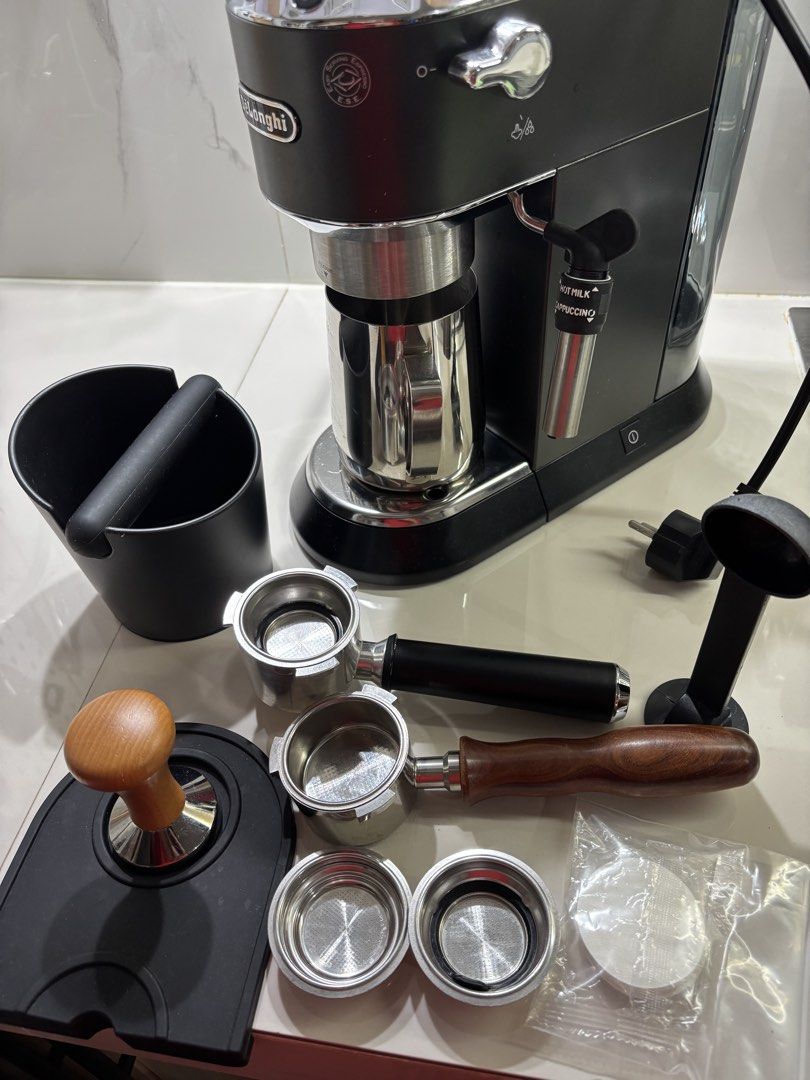 DeLonghi Espresso Machine with Accessories (Category: Coffee Machines & Makers) located in Pasig City. Submitted by eijisells (Listing ID 1464520627, Image 1). Description: FOR SALE — De’Longhi Dedica EC685 Espresso Machine + Barista Accessories ₱11,000 NEGOTIABLE Selling my De’Longhi Dedica EC685 complete espresso setup. Machine is around 3 years old, but well-maintained and in good working condition. The additional accessories were purchased on