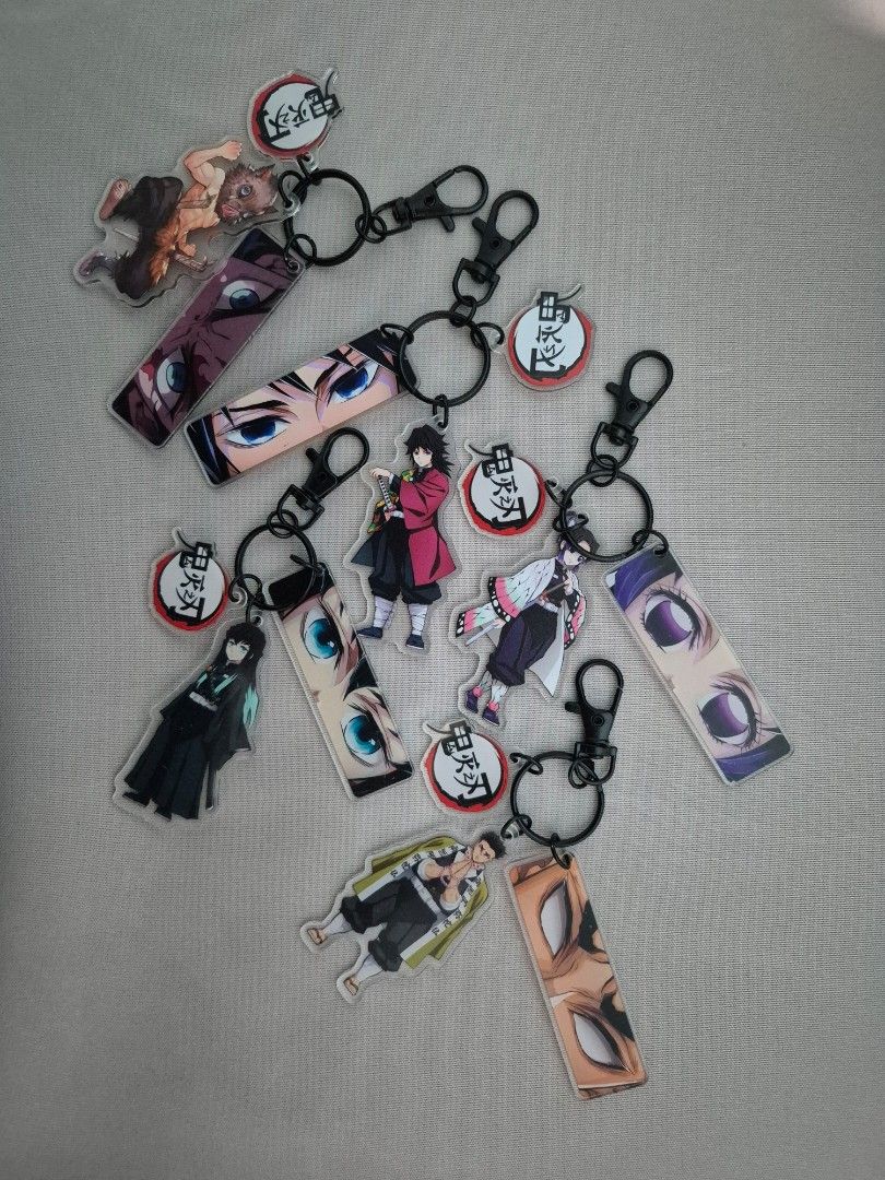 Demon Slayer Acrylic Keychains (Category: Character Goods) located in Malasiqui. Submitted by yoonisthings (Listing ID 1464504991, Image 1). Description: Demon Slayer Acrylic Keychain ₱50each **​Buy 2 or more to get more discounts Available characters: ~ Giyuu ~ Gyomei ~ Shinobu ~ Muichiro ~ Inosuke.