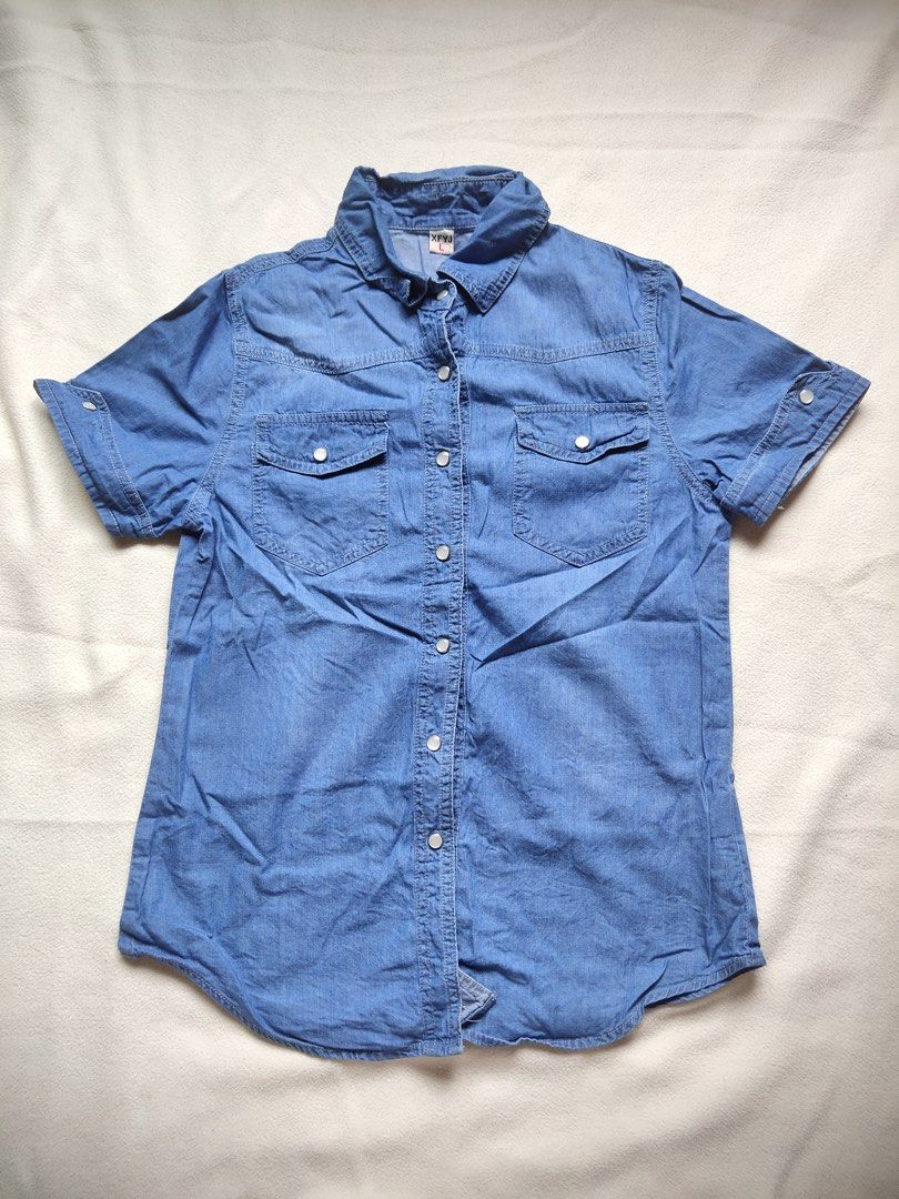 Denim Short Sleeve Shirt (Category: Shirts) located in Caloocan City. Submitted by angelinee123 (Listing ID 1464408847, Image 2). Description: Large - lightly used •Payment methods: Gcash (item price + sf) • Payment first policy • Delivery option: - J&t delivery : 2-3 days depends on loc - Lalamove: same day delivery - meetup: 5th avenue lrt station only (cod avail) .