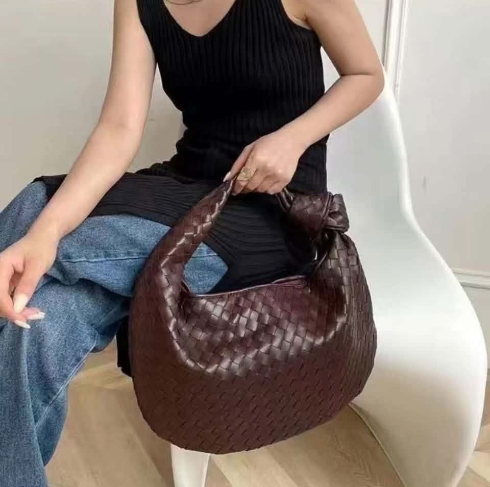 Designer Woven Leather Hobo Bag (Category: Shoulder Bags) located in Malabon City. Submitted by tinxoxo (Listing ID 1464526397, Image 1). Description: - Beautiful woven leather hobo bag - Deep brown color - Unique knotted strap detail - Spacious interior for all your essentials - Versatile: perfect for everyday use or a night out - Effortlessly chic with jeans or a dress.