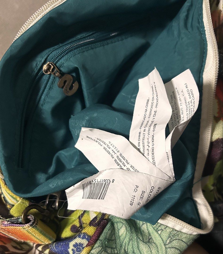 DESIGUAL (Category: Cross-body Bags) located in Davao. Submitted by sart0ria85 (Listing ID 1464502930, Image 3). Description: A printed Canvas bag in multicolor prints. Adjustable sling. 100% POLYESTER MADE IN CHINA MEDIUM SIZE. Speedy. EXCELLENT CONDITION (94/100).
