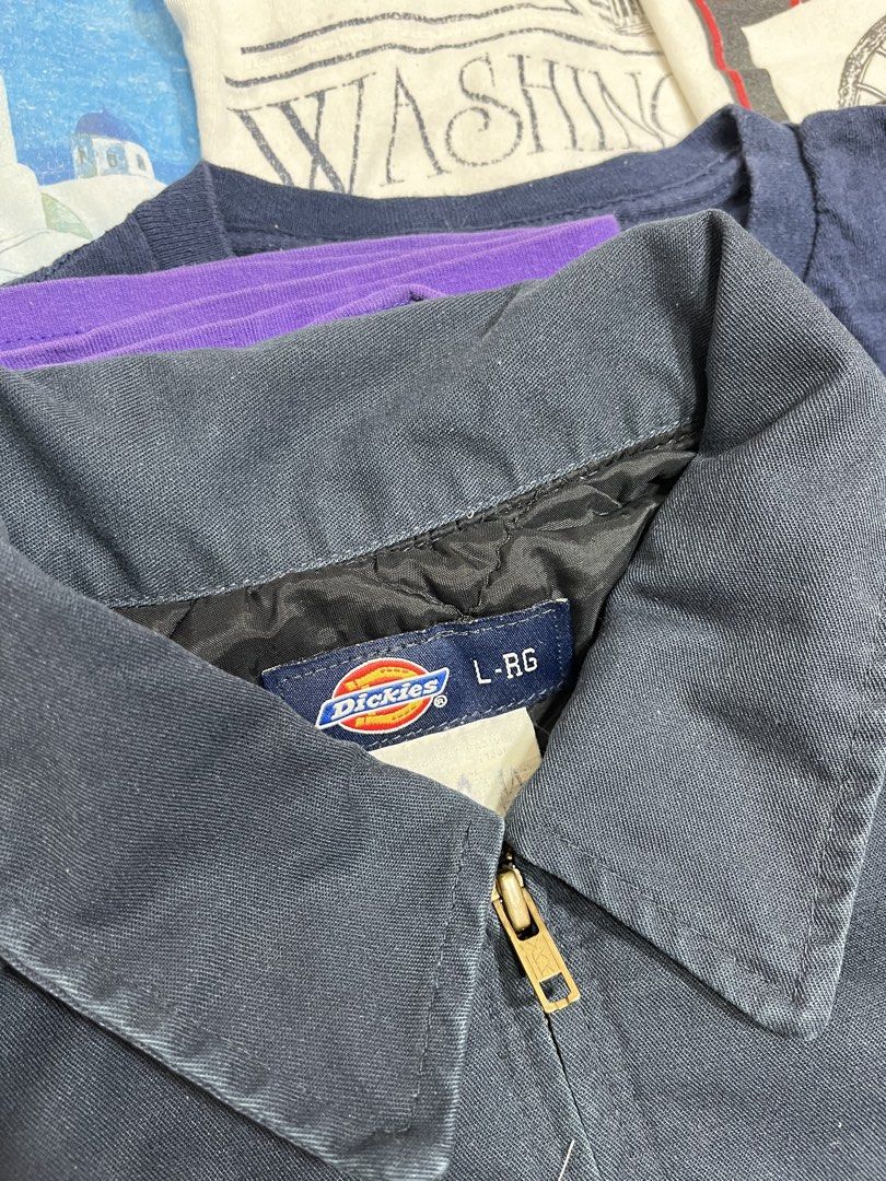 Dickies Basin Water Work Jacket L-RG (Category: Coats, Jackets and Outerwear) located in Baao. Submitted by plainclothesdept (Listing ID 1464533326, Image 2). Description: Dickies Basin Water Workwear width - 23 in. length - 25 in. stains - Navy blue Dickies work jacket - Features 'Basin Water' logo on chest - Quilted lining for warmth - Zipper closure - Minor marks on fabric (adds character!) - Perfect for work or casual outfits.