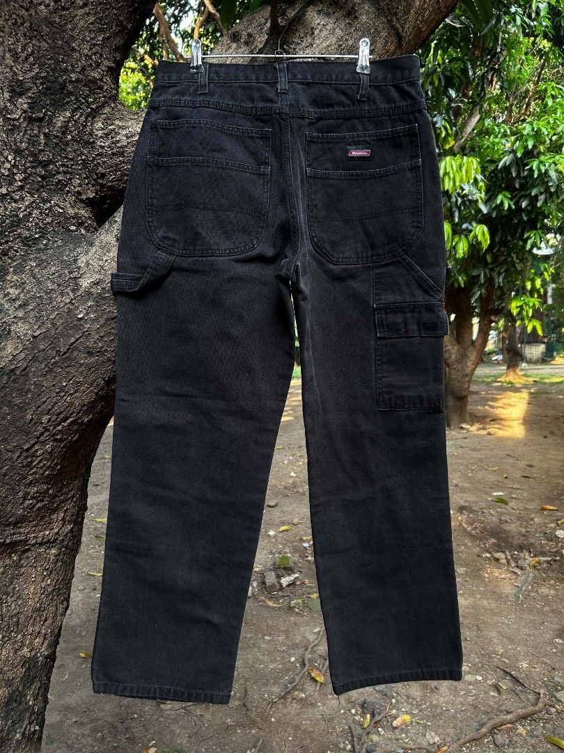 Dickies Black Carpenter Pants (Category: Jeans) located in Taguig. Submitted by actualizeboutique (Listing ID 1464432430, Image 1). Description: - Classic black Dickies carpenter pants - Made from durable denim material - Features multiple utility pockets - Straight leg fit for a comfortable silhouette - Versatile for both workwear and casual outfits - A timeless wardrobe staple.