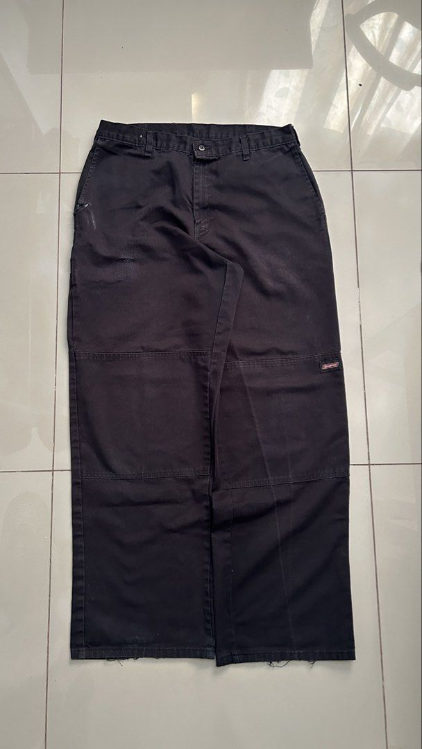 Dickies Black Work Pants (Category: Trousers) located in Calamba. Submitted by lancedrew888317 (Listing ID 1464360196, Image 2). Description: - Black Dickies work pants - Double knee design for durability - Minor marks on front left leg - Bottom hems show slight fraying - Perfect for everyday wear or tough work environments.