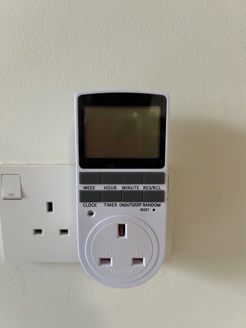 Digital Timer with Plug Socket (Category: Electrical, Adaptors & Sockets) located in Singapore. Submitted by desiree__ (Listing ID 1464455806, Image 1). Description: - Automate your appliances with scheduled on/off times. - Perfect for lights, fans, and other devices. - Easy plug-and-play setup with included instructions. - Simply plug the timer into the wall and your appliance into the timer. - Maximum load capacity: 13A..
