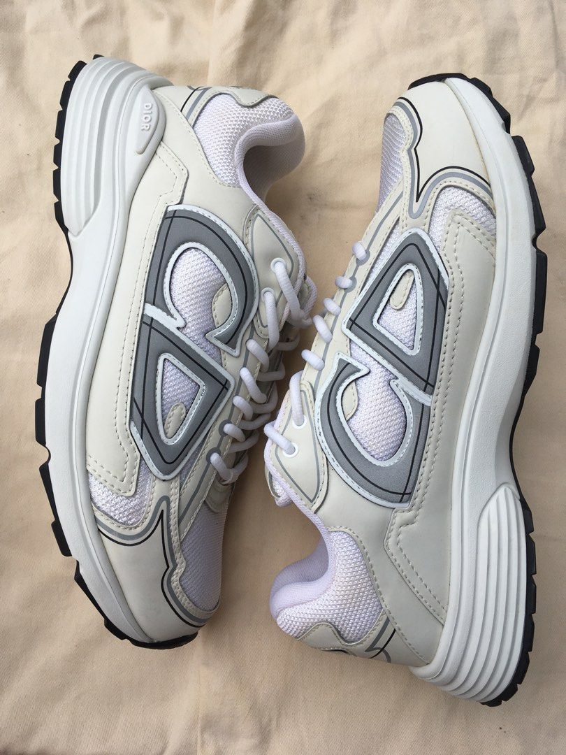 Dior B30 Sneakers for Men (Category: Sneakers) located in Taguig. Submitted by sorted_luxury (Listing ID 1464458672, Image 3). Description: - Dior B30 Sneakers for Men - Size: UK 8 / EU 42 - Colorway: White and Grey - Features: Classic CD logo on the side - Style: Comfortable and stylish, perfect for everyday wear.