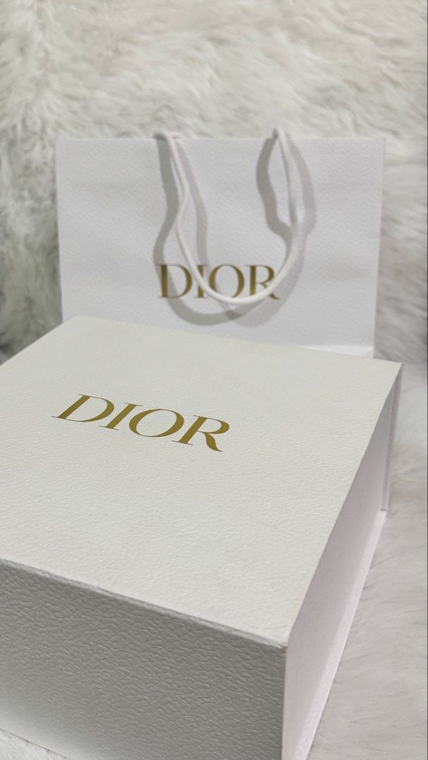 Dior Bundle (Category: Makeup) located in Caloocan City. Submitted by anicaaaaaa (Listing ID 1464566390, Image 3). Description: - Authentic Dior Products Includes: Shower Gel (unclear plastic) Body Milk (unclear plastic) Lip Glow Oil Shade 072 GWP Lip Oil Pink Case GWP Key Ring Dior Le Baume Limited Edition - Comes with original Dior box & paperbag Free 3 dior samples All brand new and authentic.