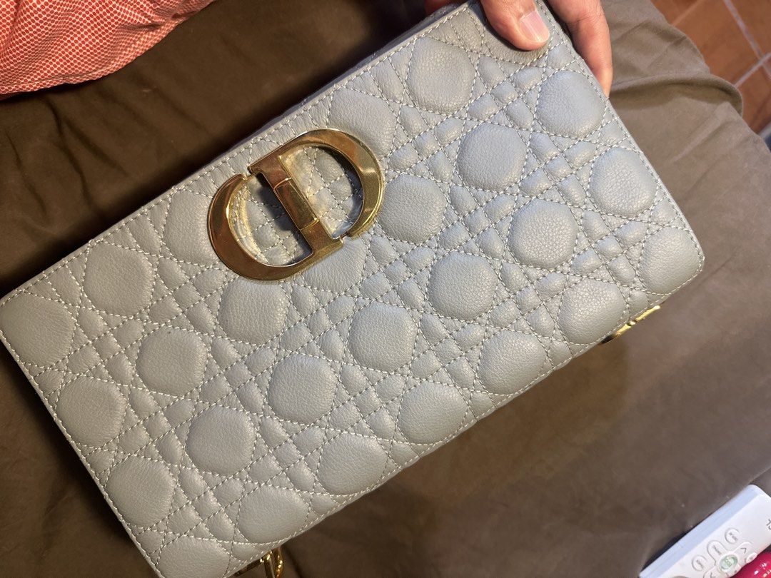 Dior Grey Quilted Leather Lady Dior Bag (Category: Luxury Bags & Wallets) located in Pasig City. Submitted by the_bag_agent (Listing ID 1464425782, Image 1). Description: - NGA Dior handbag in elegant grey leather. - Features signature cannage quilting. - Iconic CD clasp closure. - Gold-tone hardware for a luxurious touch. - Includes an interior zippered pocket for essentials. - Embossed Dior lettering on the side. - Versatile design suitable for