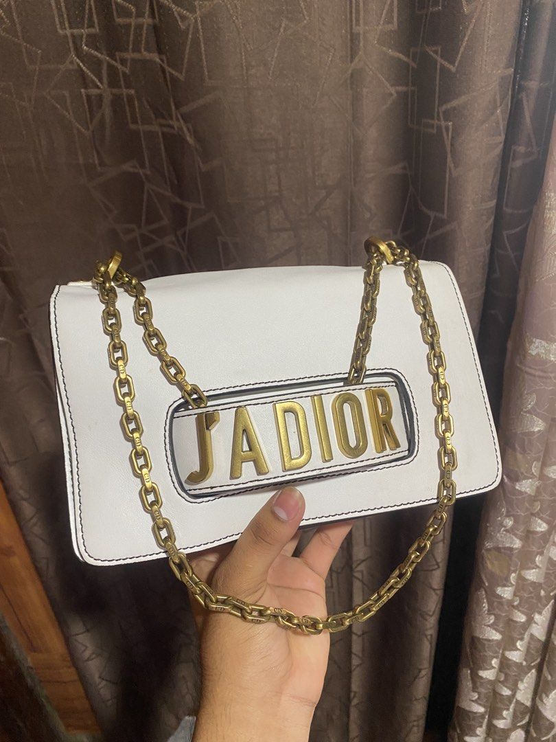 Dior J'adior White Leather Chain Shoulder Bag (Category: Luxury Bags & Wallets) located in Manila. Submitted by bvd9dwnrgf23014 (Listing ID 1464360510, Image 1). Description: - white leather Dior J'adior shoulder bag - Features a chic gold-tone chain strap - Prominent 'J'adior' lettering on the front - Classic and versatile design - Ideal for both daytime and evening wear SUPERRR SALEEEEE!!!!.