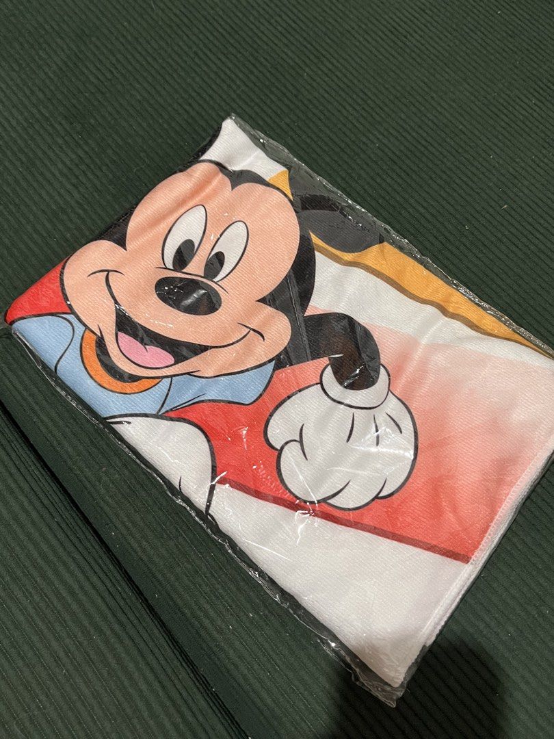 Disney Run Towel (Category: Bedding & Towels) located in Quezon City. Submitted by shiroboi04 (Listing ID 1464499434, Image 1). Description: - Cute Mickey Mouse design - Bright and colorful - Made of soft material - Brand new, still in original packaging - Perfect for Disney fans or as a gift (Not a collector) .