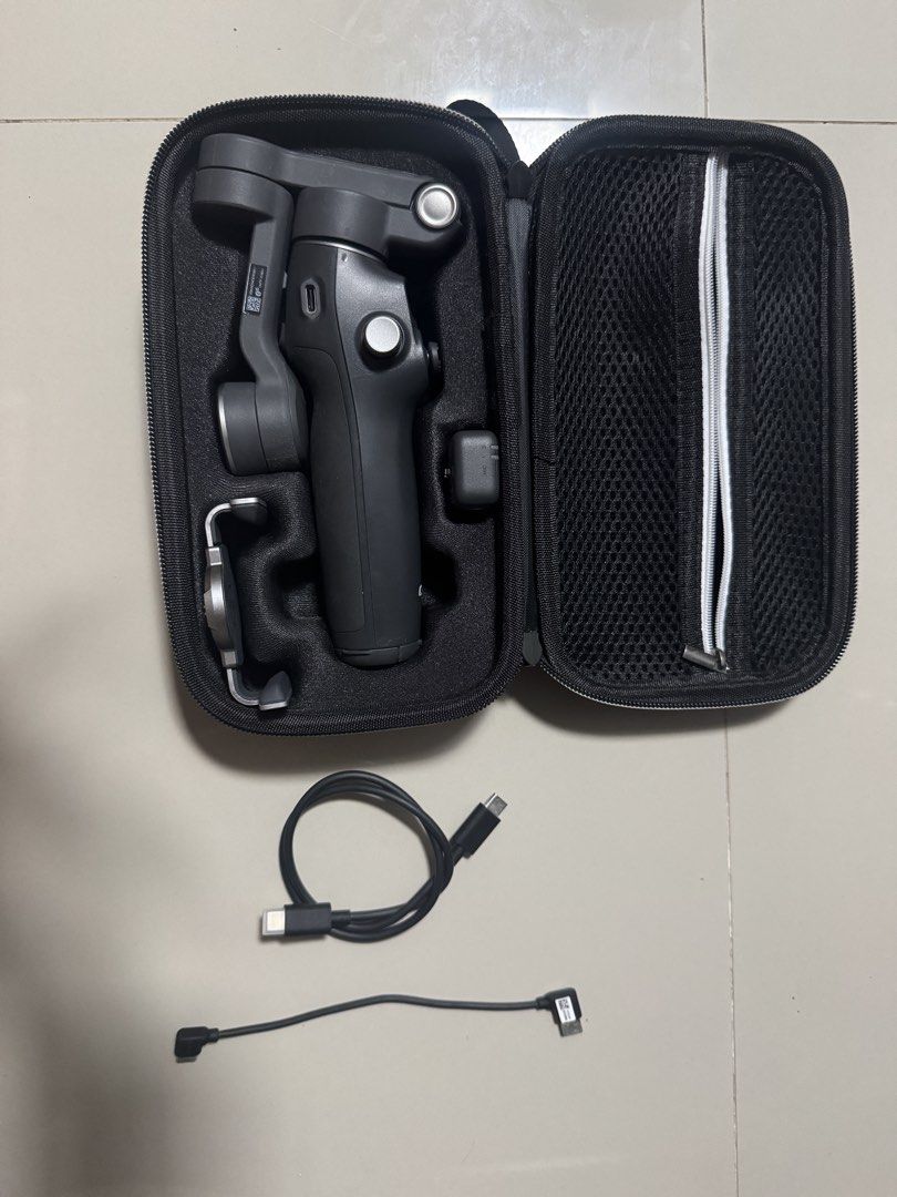 DJI Osmo Mobile 7p (Category: Other Gadgets) located in Caloocan City. Submitted by kitchap.10 (Listing ID 1464359059, Image 2). Description: Lady owned (bought it a year ago) Use it for only in events in school and needed funds for my thesis All works perfectly Inclusuon - The case itself for the osmo mobile - Complete with box - the OM7P accessories If kukunin agad I can lower the price☺️ Can do meetup around Gen T. De leon Sm Grand/ Sm Valenzu
