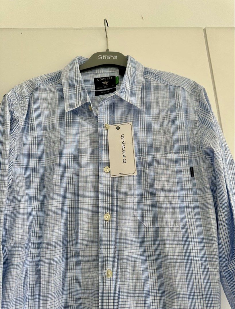 Dockers Men’s Light Blue Checkered Longsleeves (Category: Formal Shirts) located in Pasig City. Submitted by JoesCloset (Listing ID 1464426406, Image 2). Description: Brand new, with tag No issues Condition: 10/10.