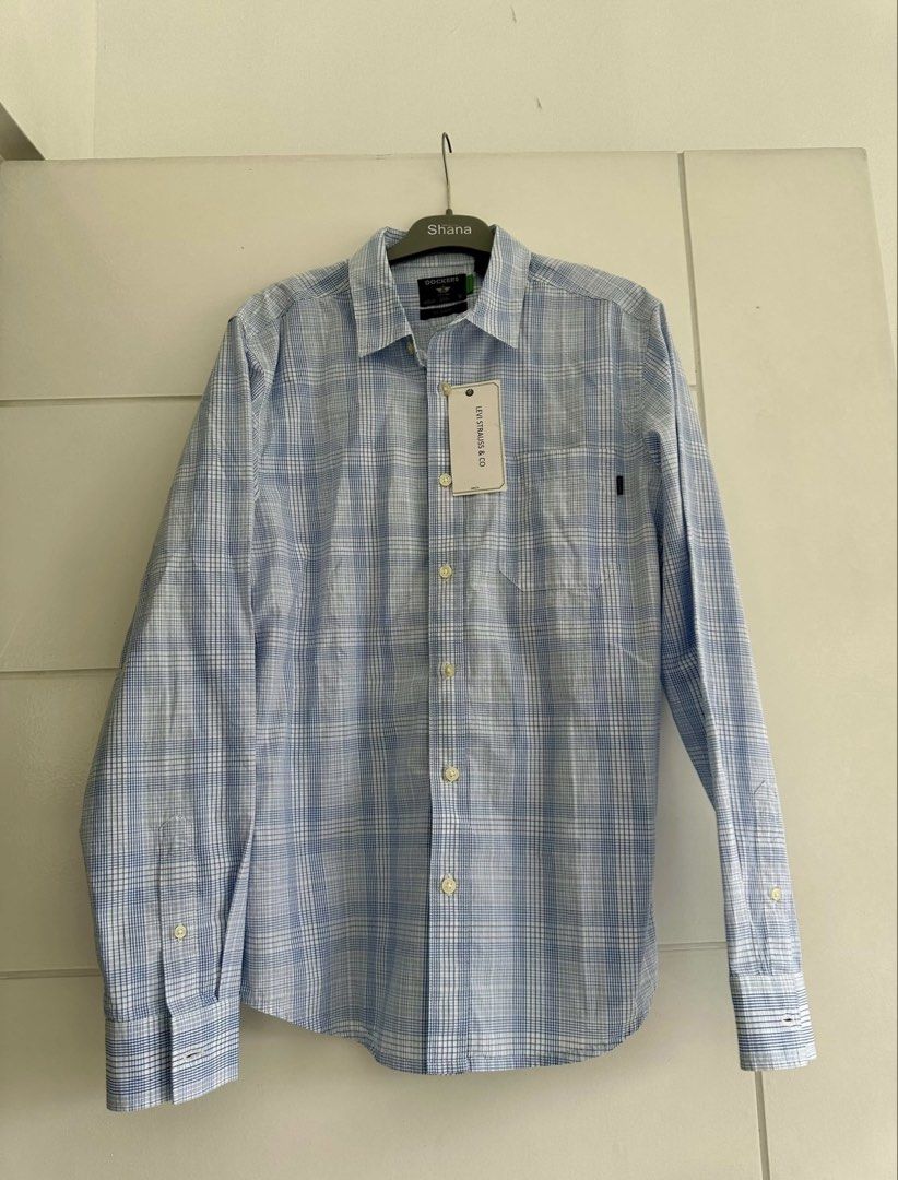 Dockers Men’s Light Blue Checkered Longsleeves (Category: Formal Shirts) located in Pasig City. Submitted by JoesCloset (Listing ID 1464426406, Image 1). Description: Brand new, with tag No issues Condition: 10/10.