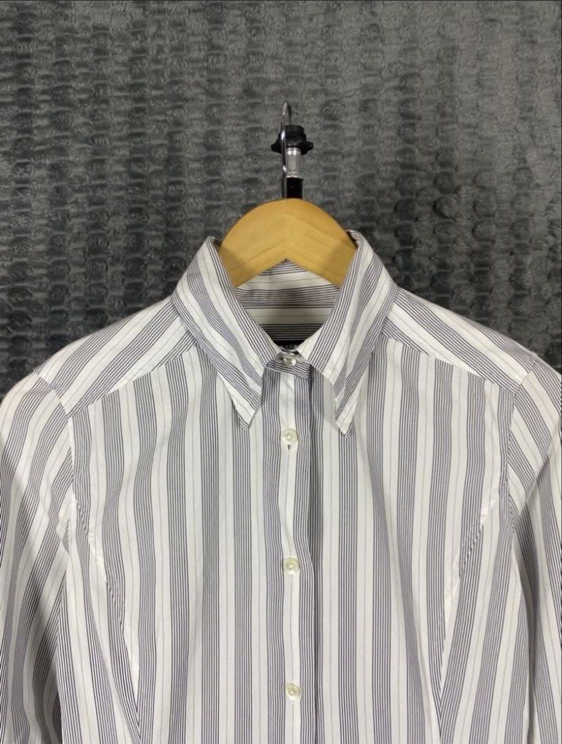 Dolce & Gabbana Striped Long Sleeves (Category: Longsleeves) located in Bacolod City. Submitted by treasurehunts.6100 (Listing ID 1464553436, Image 3). Description: Dolce & Gabbana Striped Long Sleeves Condition - Excellent Color - Color rate - 9.8 / 10 Flaws - Minor Stain, Cracked Button ( Barely Noticeable, Look at the last photo ) Size 40 Dimensions : Width - 18 Length - 26.5 .