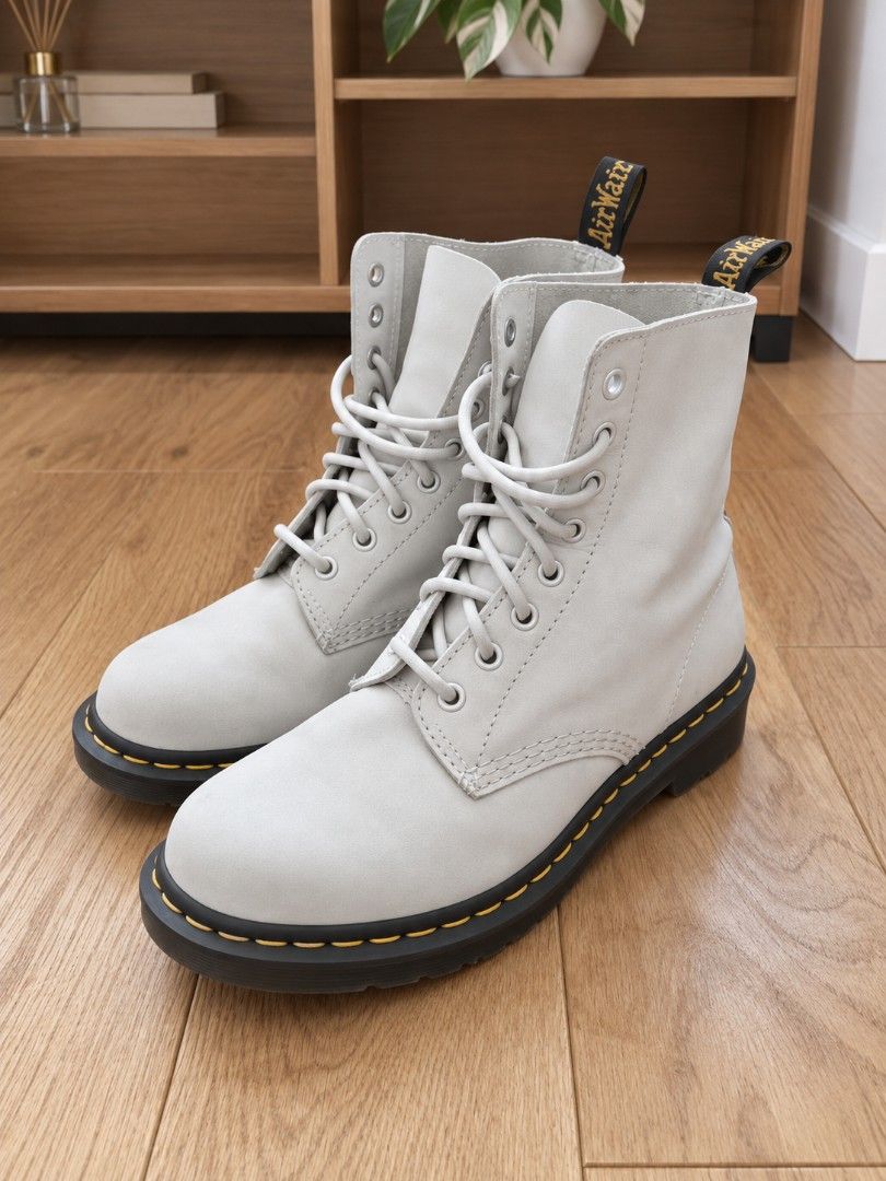 Dr. Martens 1460 Pascal Boots (Category: Boots) located in Manila. Submitted by olxph_963192328 (Listing ID 1464401349, Image 2). Description: - Dr. Martens Pascal Boots - Color: White Leather - Size: UK 4 / EU 37 - Origin: Made in Vietnam Bought in Trinoma Original Price: 13,500 last photo shows a bit of dirt and stains but it still to look at, maybe need to get a deep, cleaning if you want it to be totally gone but it actually give a nice touch