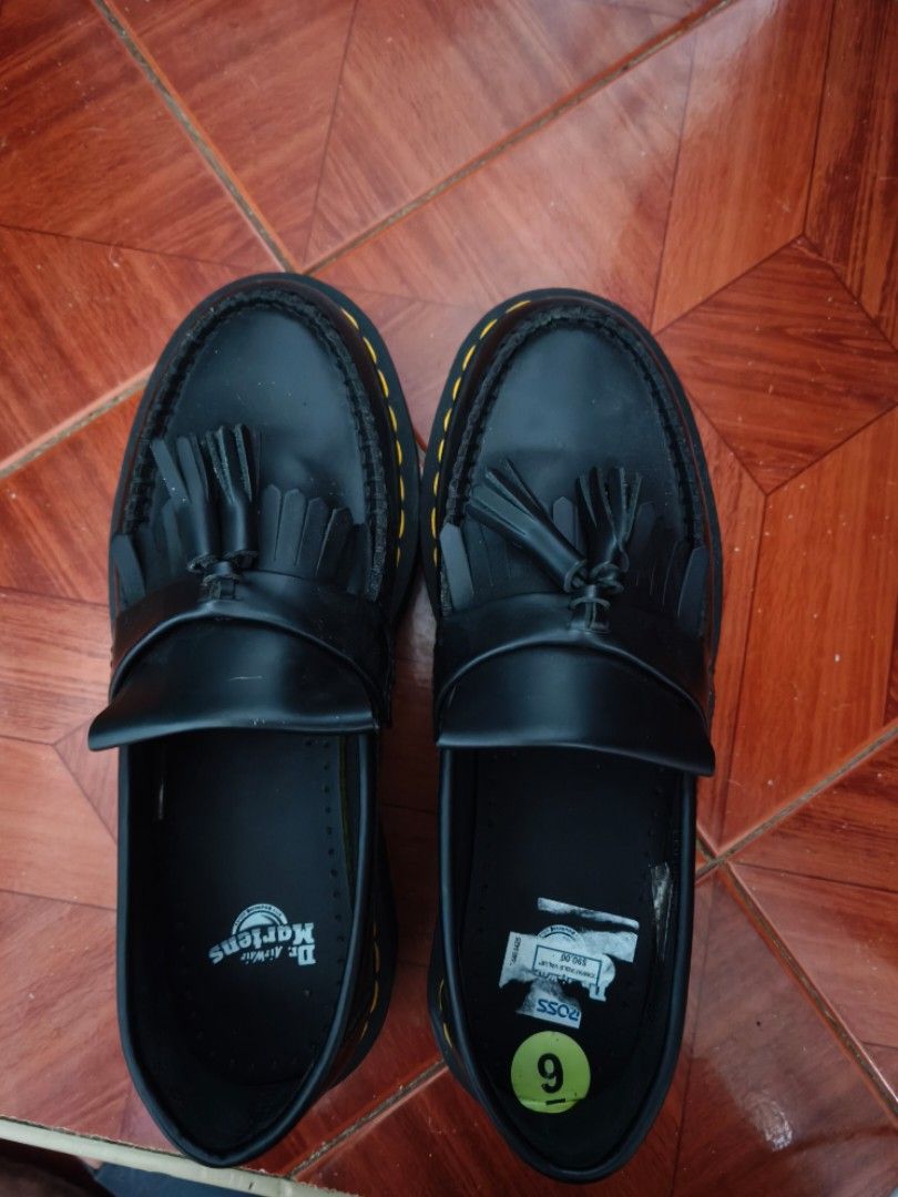 Dr. Martens Black Leather Tassel Platform Loafers (Category: Loafers) located in Makati City. Submitted by ferz971 (Listing ID 1464403294, Image 1). Description: - Brand: Dr. Martens - Color: Black - Material: Leather - Style: Tassel Loafers - Sole: Platform with signature yellow stitching - Size: 9 (US/PH) - Condition: Used once only, intact sole, stitching, no scratches, matte leather Great for dressing up or down. Please check photos for detai