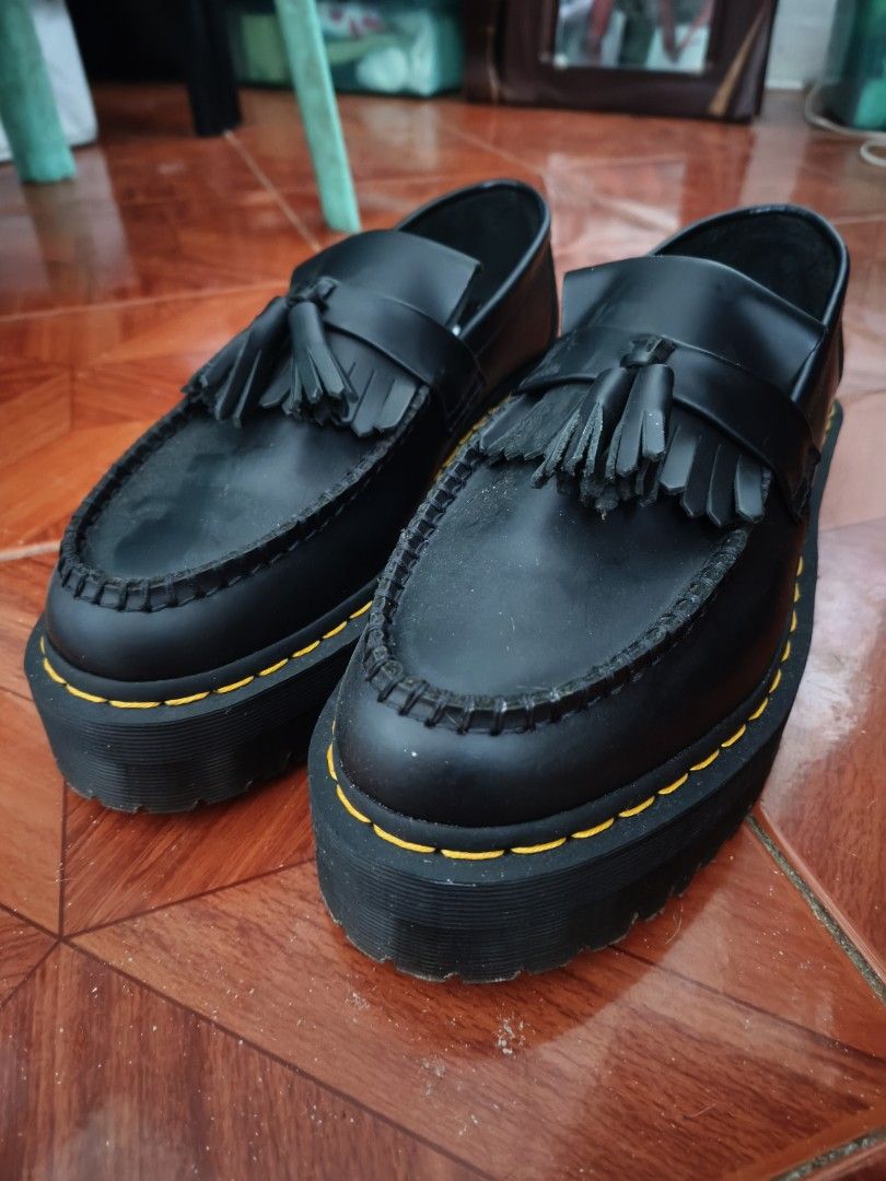 Dr. Martens Black Leather Tassel Platform Loafers (Category: Loafers) located in Makati City. Submitted by ferz971 (Listing ID 1464403294, Image 2). Description: - Brand: Dr. Martens - Color: Black - Material: Leather - Style: Tassel Loafers - Sole: Platform with signature yellow stitching - Size: 9 (US/PH) - Condition: Used once only, intact sole, stitching, no scratches, matte leather Great for dressing up or down. Please check photos for detai
