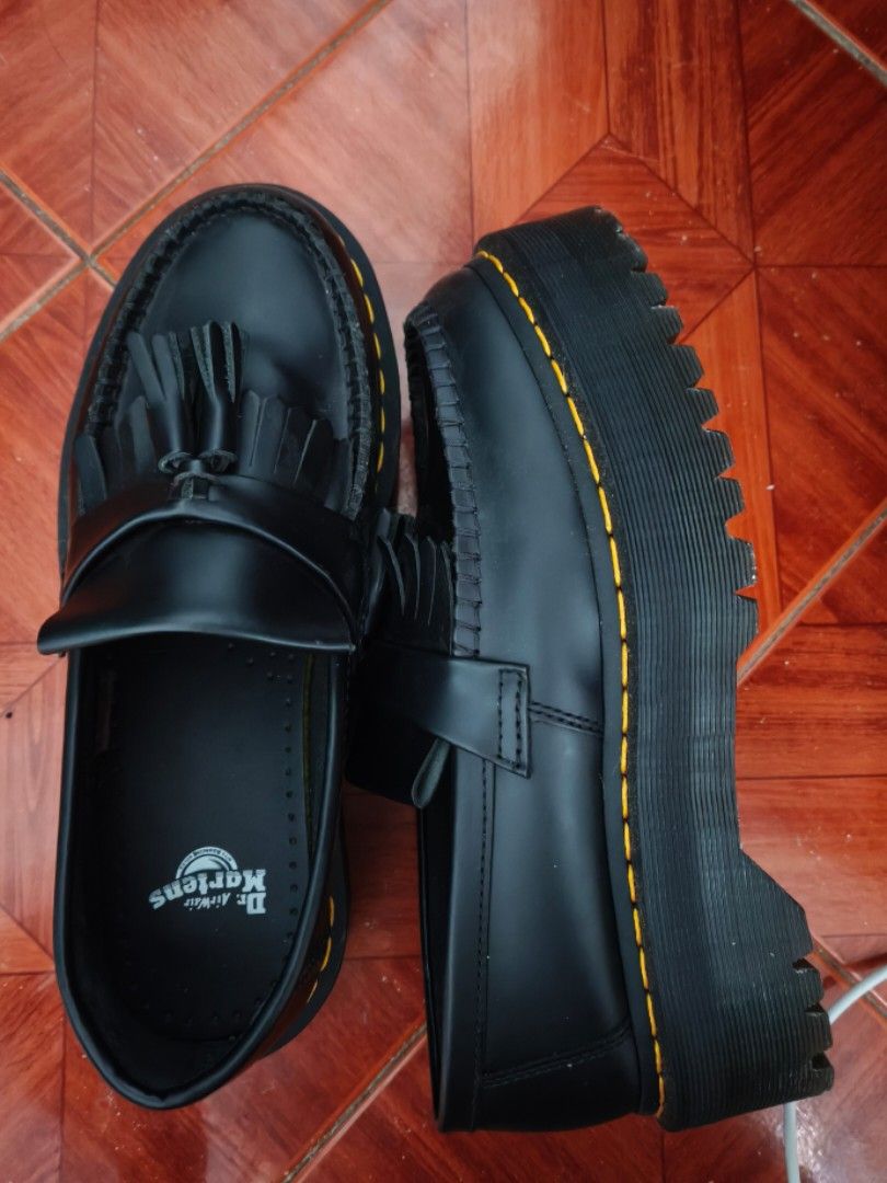Dr. Martens Black Leather Tassel Platform Loafers (Category: Loafers) located in Makati City. Submitted by ferz971 (Listing ID 1464403294, Image 3). Description: - Brand: Dr. Martens - Color: Black - Material: Leather - Style: Tassel Loafers - Sole: Platform with signature yellow stitching - Size: 9 (US/PH) - Condition: Used once only, intact sole, stitching, no scratches, matte leather Great for dressing up or down. Please check photos for detai