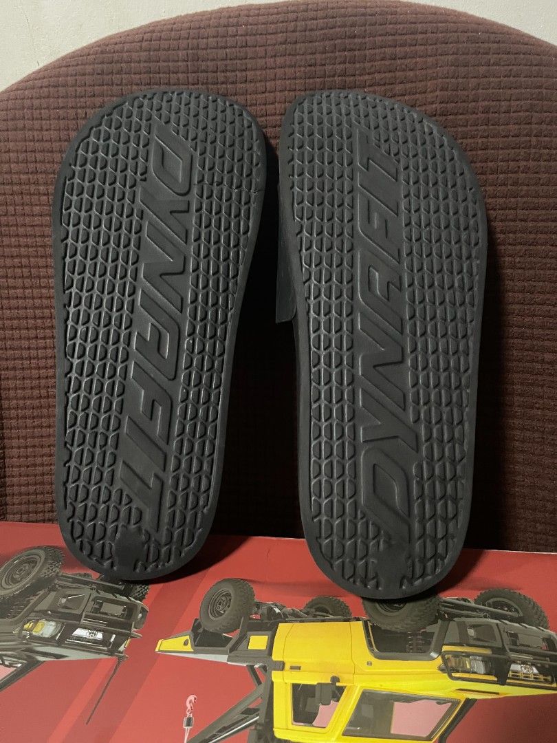 Dynafit Black Slides (Category: Slippers & Slides) located in Davao. Submitted by dareyl_121422 (Listing ID 1464464036, Image 3). Description: - Dynafit slides in classic black. - Features the iconic Dynafit logo on the strap. - Designed for ultimate comfort, ideal for everyday wear or post-activity recovery. - Effortless slip-on style for convenience..