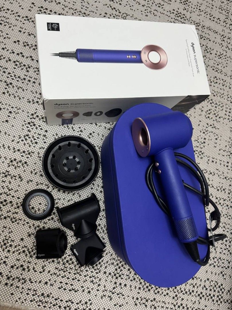 Dyson Supersonic Hair Dryer [ORIGINAL] (Category: Hair) located in Pasig City. Submitted by jjjgsforpres (Listing ID 1464386679, Image 1). Description: Dyson Supersonic Hair Dryer HD08 (Vinca Blue/Rosé) with Presentation Case Complete set & accessories. With manual and original leather box. Bought in Nov 2024. Currently retails at Php26,900 RFS: Upgraded to another Dyson product - Original box and leaflets included - Ideal for quick drying and st