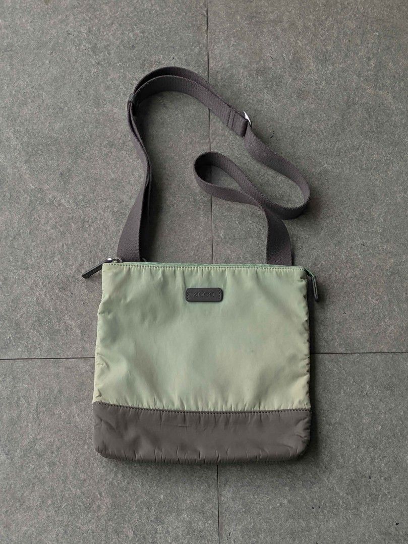 Ecco sling bag crossbody bag small bag (Category: Cross-body Bags) located in San Mateo. Submitted by rick_enzo (Listing ID 1464509079, Image 3). Description: for sale ecco crossbody bag ecco sling bag original and authentic adjustable strap two-toned green excellent condition 1300 san mateo, rizal meetup within san mateo, or gma kamuning during wednesdays delivery lalamove j&t first to pay, can vidcall — also selling more items, check profile.