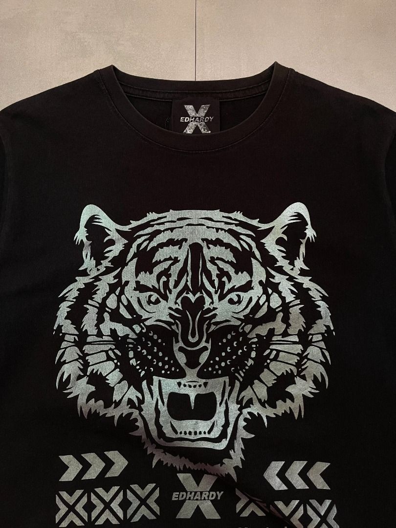 Ed Hardy tee shirt (Category: Tshirts & Polo Shirts ) located in Cabanatuan. Submitted by argarments.ph (Listing ID 1464477259, Image 3). Description: Tagged: Large on tag Width 21.5" | Length 29" Condition: Good condition Issue(s): Bit fade.