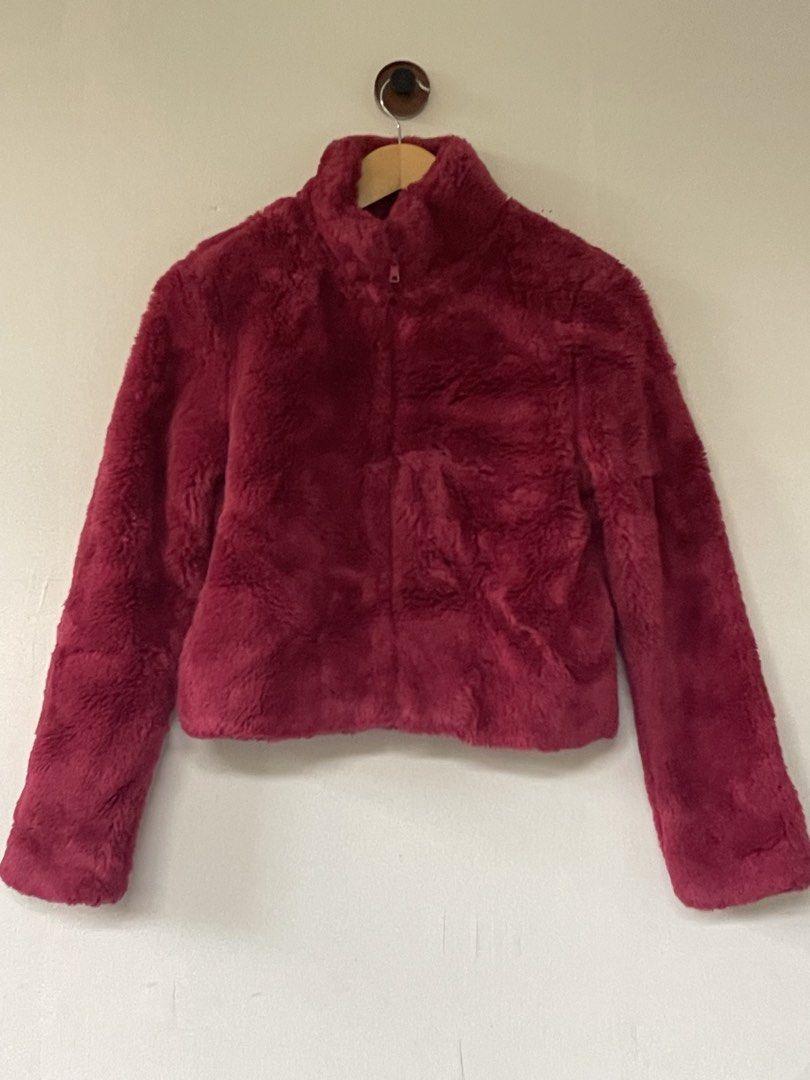 EDC by Esprit Faux Fur Jacket Large (Category: Babies & Kids Fashion) located in Quezon City. Submitted by witchinthecity (Listing ID 1464439869, Image 1). Description: - Super cozy faux fur jacket - Brand: EDC by Esprit - Size: L Kids - Features: Zip-up front, silky lining - Color: Deep berry / dark pink - stored in closet for a long time -shoulder to hem: 19.5 inches.