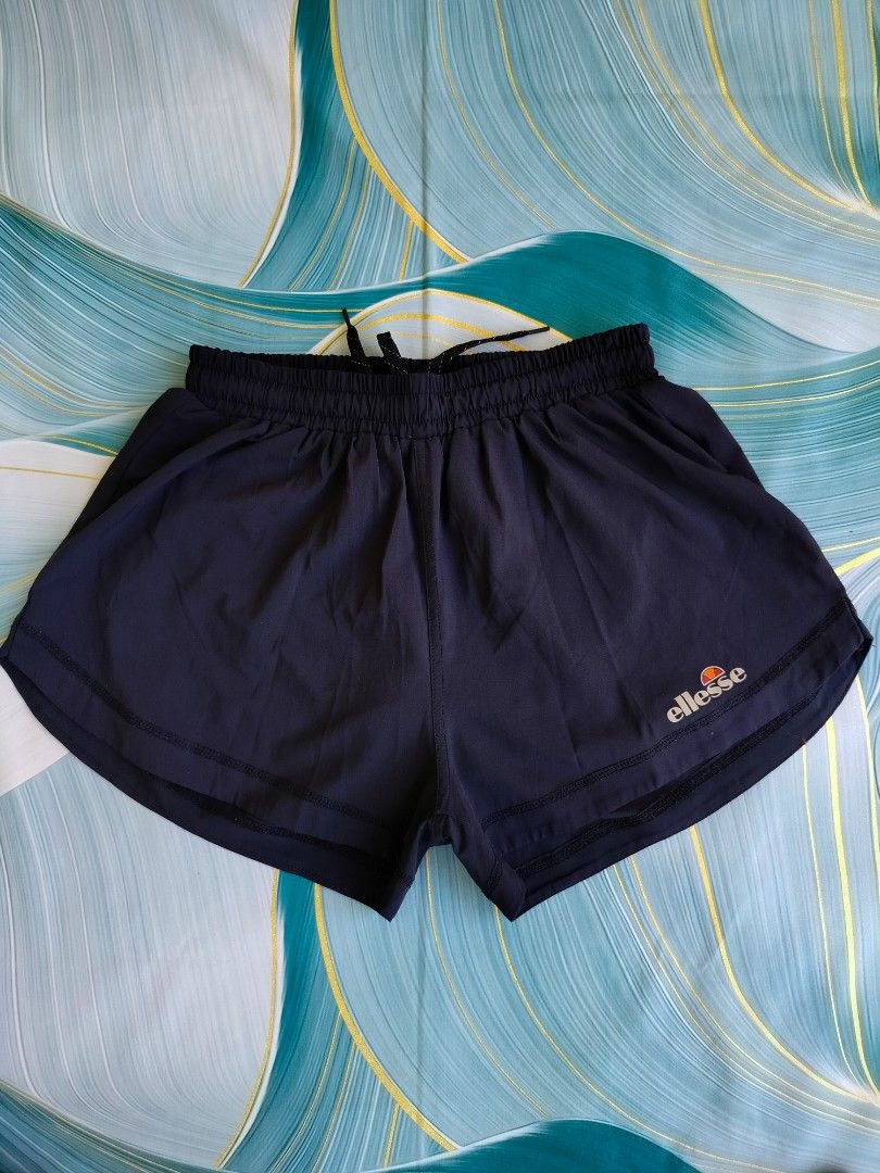 Ellesse Navy Blue Athletic Shorts (Category: Activewear) located in Manila. Submitted by virgiliosa38485 (Listing ID 1464498572, Image 1). Description: - Navy blue Ellesse athletic shorts -Waist 26-33 - Elastic waistband with drawstring - Small Ellesse logo detail on left leg - Ideal for sports and casual wear - Comfortable and lightweight material.