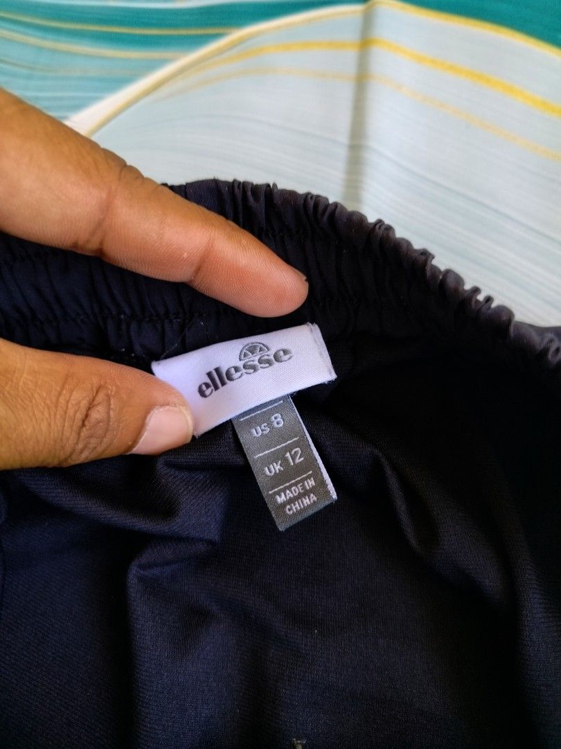 Ellesse Navy Blue Athletic Shorts (Category: Activewear) located in Manila. Submitted by virgiliosa38485 (Listing ID 1464498572, Image 3). Description: - Navy blue Ellesse athletic shorts -Waist 26-33 - Elastic waistband with drawstring - Small Ellesse logo detail on left leg - Ideal for sports and casual wear - Comfortable and lightweight material.