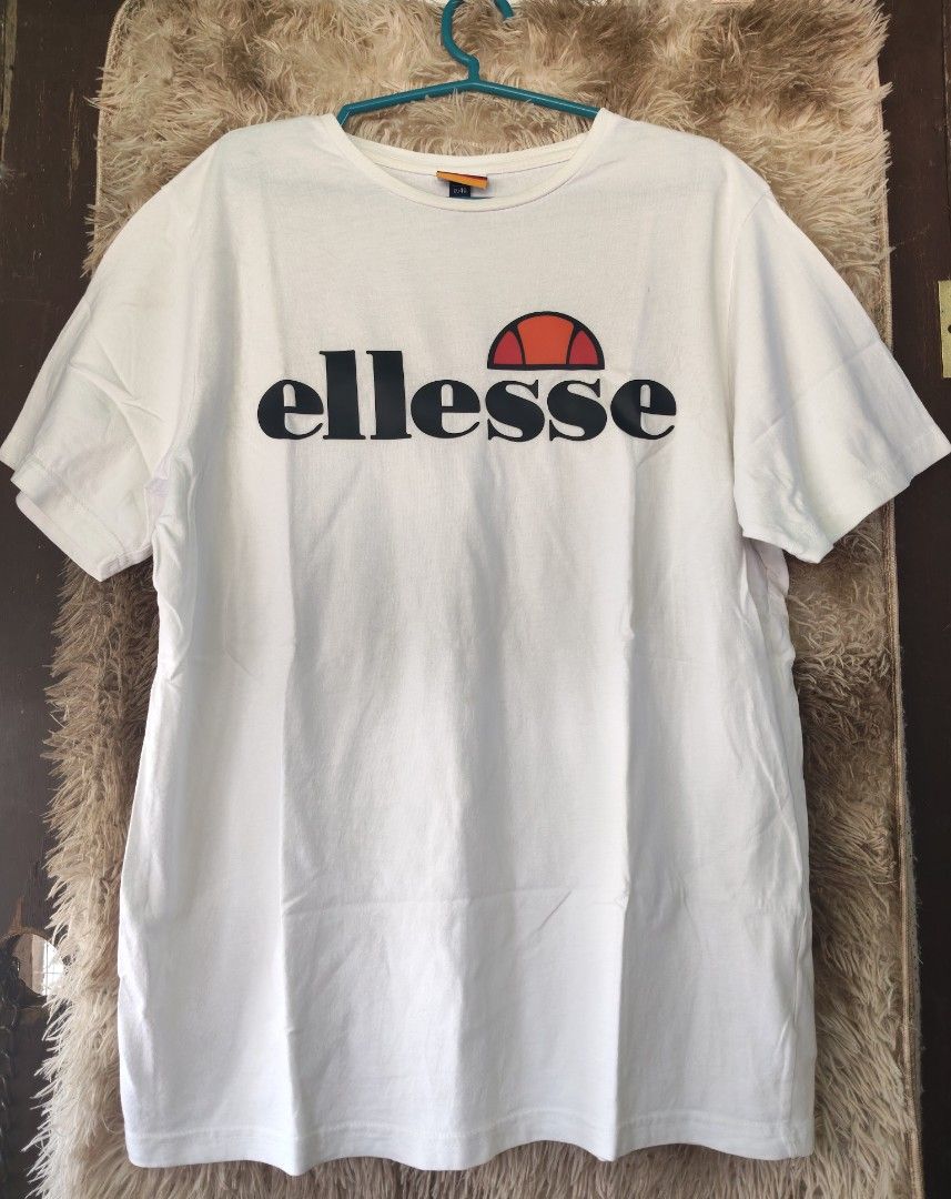 Ellesse White T-shirt with Logo (Category: Shirts) located in Rizal, Mindoro Occidental. Submitted by finding_ukaygems5103 (Listing ID 1464474071, Image 1). Description: - Classic white Ellesse t-shirt - Features iconic Ellesse logo on the front - Made from 100% cotton for ultimate comfort - Ideal for everyday casual wear - Simple, stylish, and versatile design.