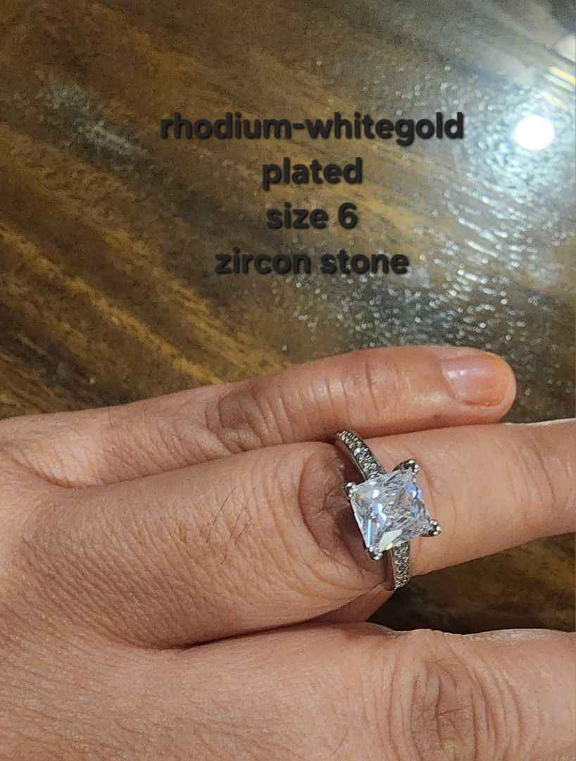 ENGAGEMENT RING size 7 (Category: Rings) located in Manila. Submitted by chrinathalie (Listing ID 1464554704, Image 3). Description: zircon stone really sparkly in person rhodium plated in real 18k whitegold SIZE 7 ITEM IS NOT PAWNABLE.