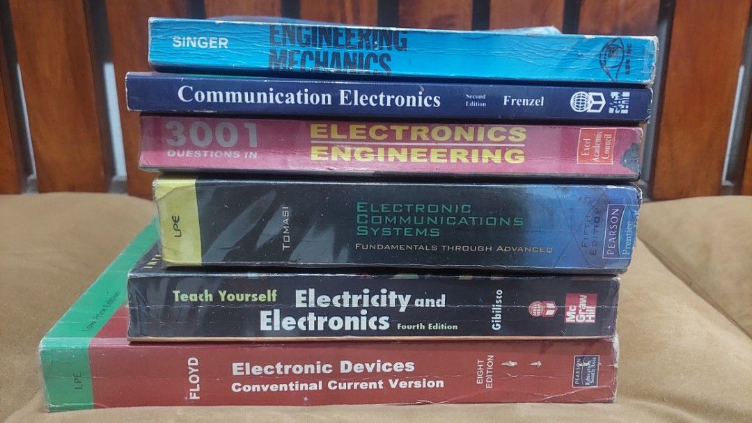Engineering & Electronics Textbooks: Calculus, Logic Design, Electronics, Mechanics (Category: Textbooks) located in Cainta. Submitted by wenchhart025692 (Listing ID 1464433562, Image 1). Description: - Bundle of engineering and electronics textbooks - Includes Calculus, Logic Design, Communication Electronics, Electronic Devices, and Engineering Mechanics - Books are in varying conditions, some good, some with signs of use - Excellent reference 