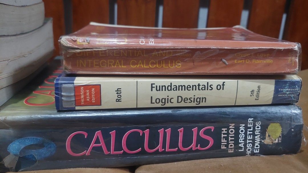 Engineering & Electronics Textbooks: Calculus, Logic Design, Electronics, Mechanics (Category: Textbooks) located in Cainta. Submitted by wenchhart025692 (Listing ID 1464433562, Image 2). Description: - Bundle of engineering and electronics textbooks - Includes Calculus, Logic Design, Communication Electronics, Electronic Devices, and Engineering Mechanics - Books are in varying conditions, some good, some with signs of use - Excellent reference 