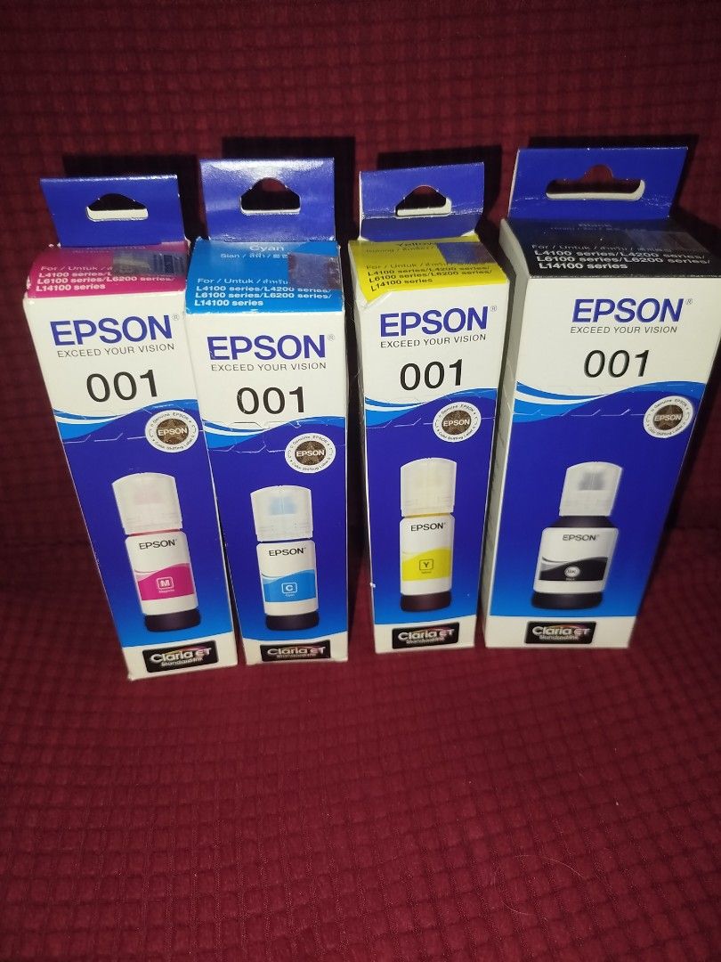 EPSON 001 Ink (Category: Printers, Scanners & Copiers) located in Quezon City. Submitted by tugeyds (Listing ID 1464462631, Image 2). Description: Brandnew, sealed. 4 colors, bundle..